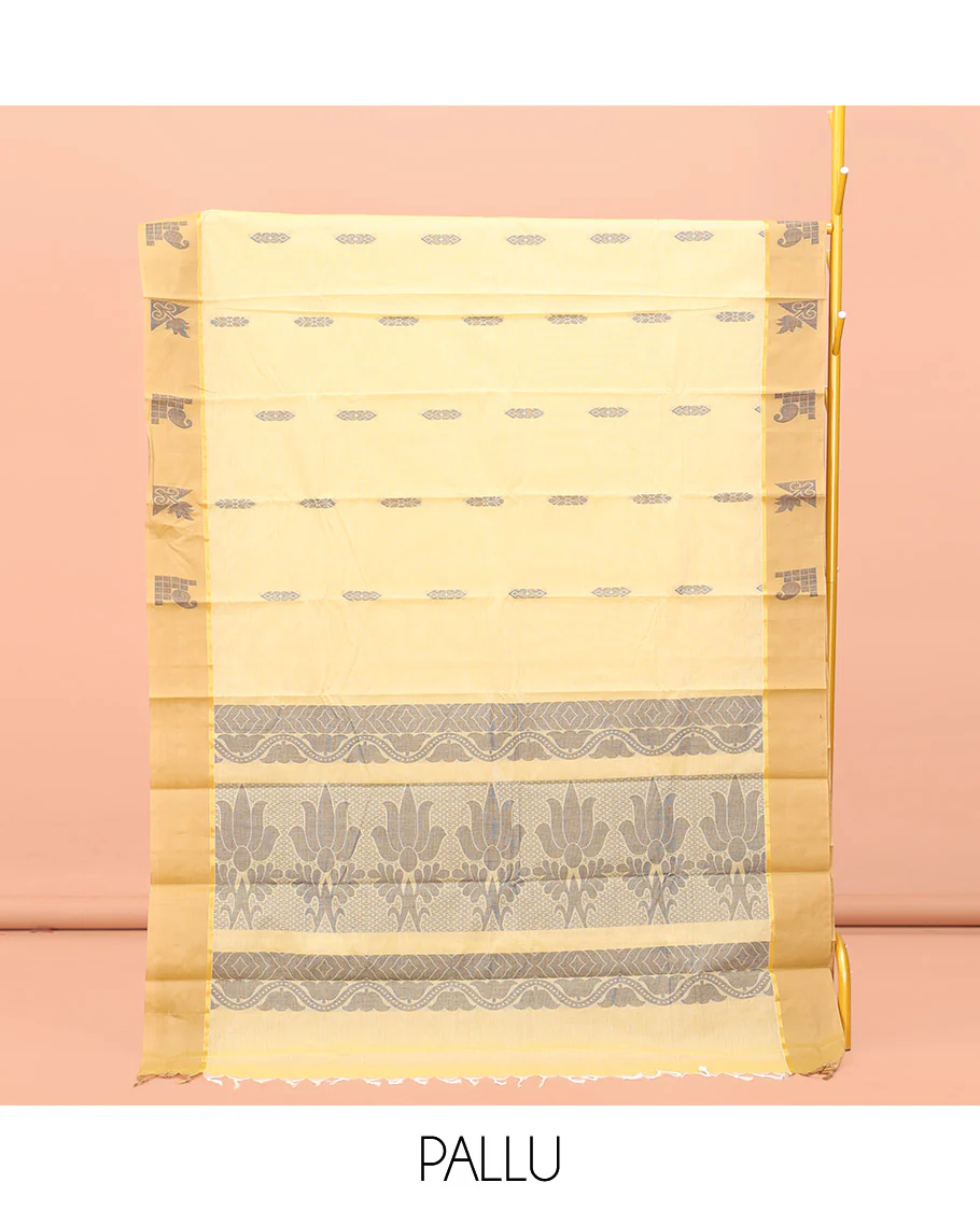 Yellow Kanchi Cotton Saree, Subtly Sparkled with Buttas All Over Its Body, Complemented by Contrast Border, Pallu of Floral Designs, and Paired with a Matching Blouse - Image 3