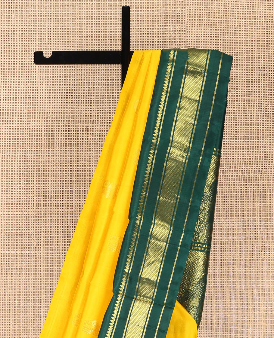 Yellow Kanchipuram Silk Saree, Adorned with Manga and Mayil Buttas, Complemented by Contrast One-Sided Korvai Border of Thilakam Mokku, Banaras, and Kuyil Kann Designs, Pallu Steeped with Mayil Designs, and Comes Without a Blouse - Image 3