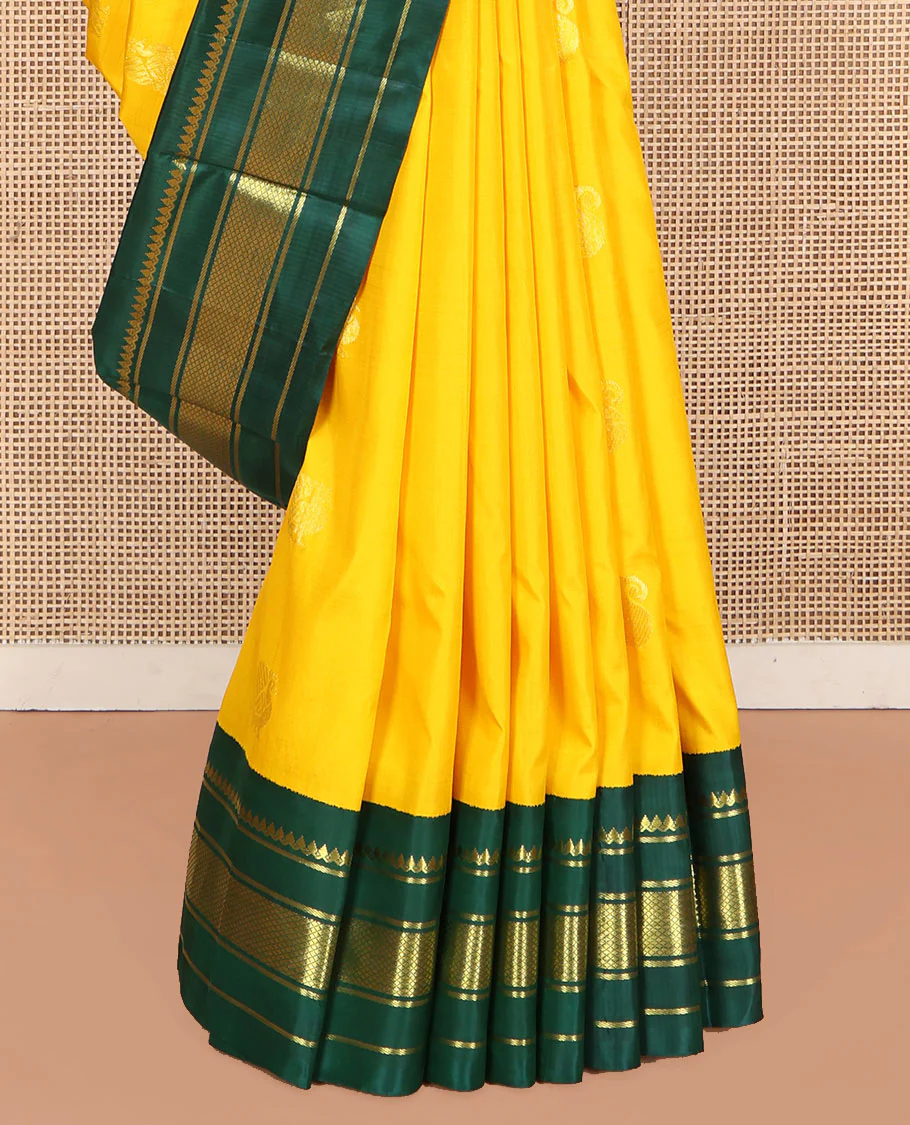 Yellow Kanchipuram Silk Saree, Adorned with Manga and Mayil Buttas, Complemented by Contrast One-Sided Korvai Border of Thilakam Mokku, Banaras, and Kuyil Kann Designs, Pallu Steeped with Mayil Designs, and Comes Without a Blouse - Image 4