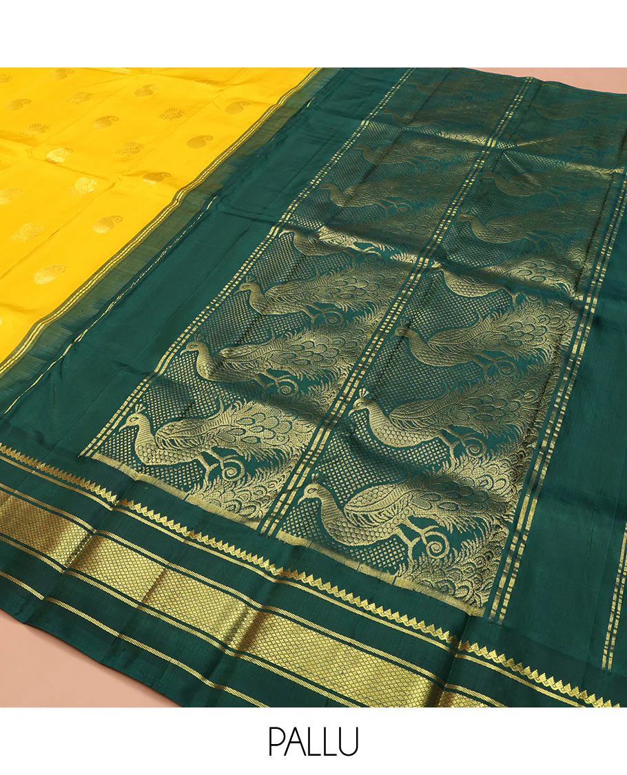 Yellow Kanchipuram Silk Saree, Adorned with Manga and Mayil Buttas, Complemented by Contrast One-Sided Korvai Border of Thilakam Mokku, Banaras, and Kuyil Kann Designs, Pallu Steeped with Mayil Designs, and Comes Without a Blouse - Image 5