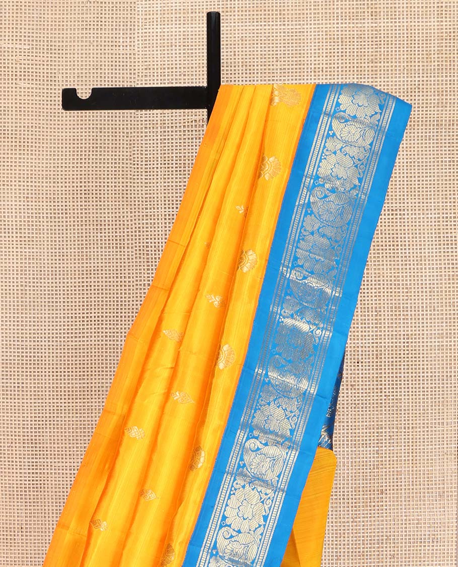 Yellow Kanchipuram Silk Saree, Ornamented with Zari Buttas on Its Body, Complemented by a Contrast One-Sided Korvai Border of Banaras, Muthu, Floral and Paisley Designs, Pallu of Intricate Designs, and Comes Without a Blouse - Image 3