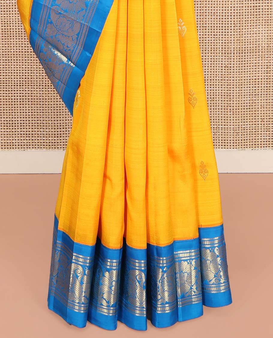 Yellow Kanchipuram Silk Saree, Ornamented with Zari Buttas on Its Body, Complemented by a Contrast One-Sided Korvai Border of Banaras, Muthu, Floral and Paisley Designs, Pallu of Intricate Designs, and Comes Without a Blouse - Image 4