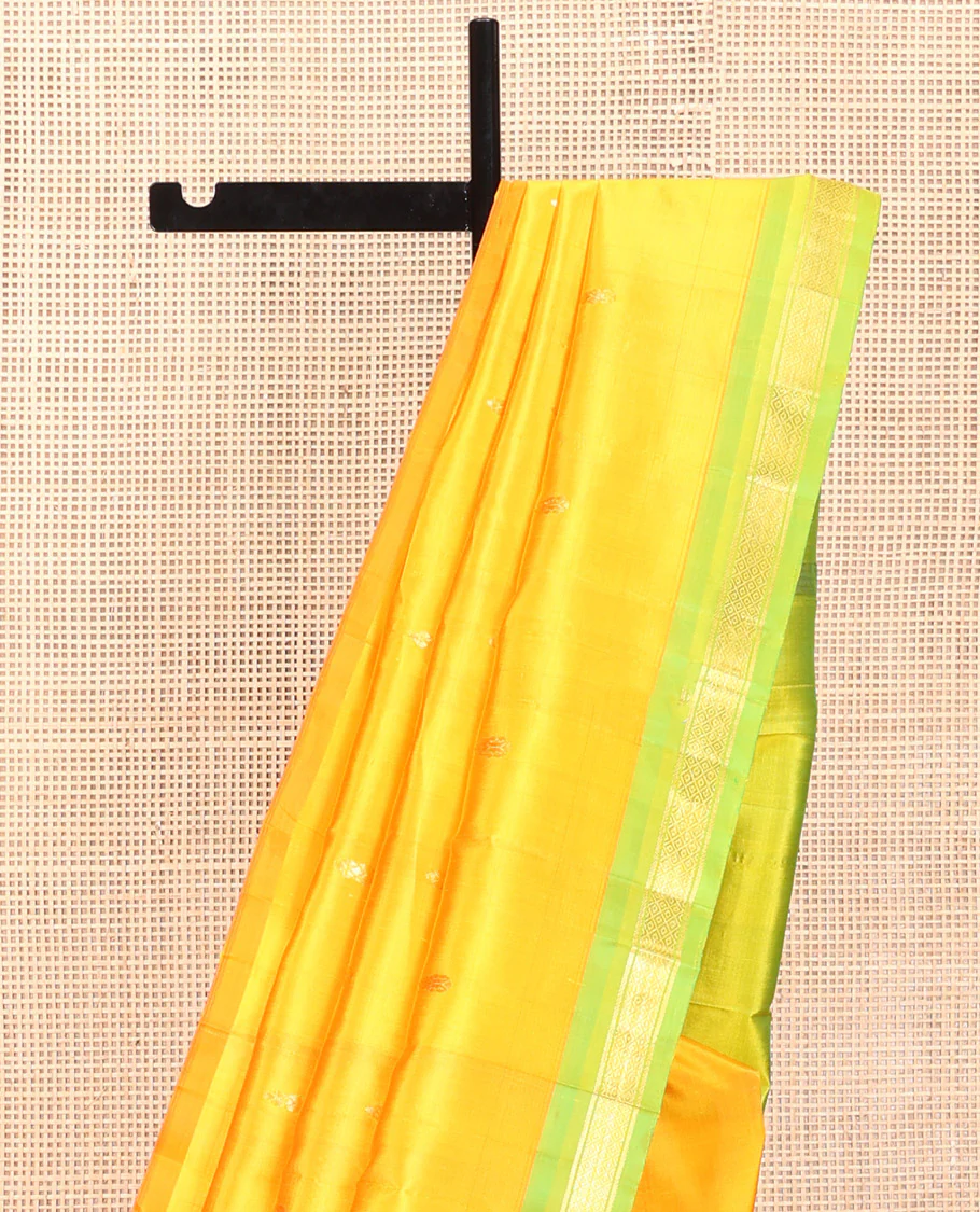 Yellow Kanchipuram Silk Saree, Subtly Sparkled with Zari Buttas, a Contrast One-Sided Border of Banaras, and Mayil Kann Design, Zari-Woven Pallu, and No Blouse - Image 3