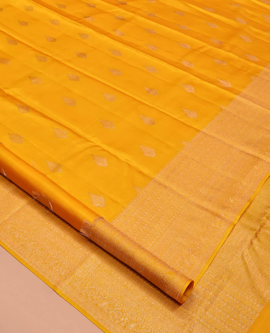 Yellow Kanchipuram Silk Saree, Subtly Sparkled with Zari Buttas All Over Its Body, Highlighted by a Zari Traditional Design Border, Grand Pallu, and Paired with a Matching Blouse - Image 2