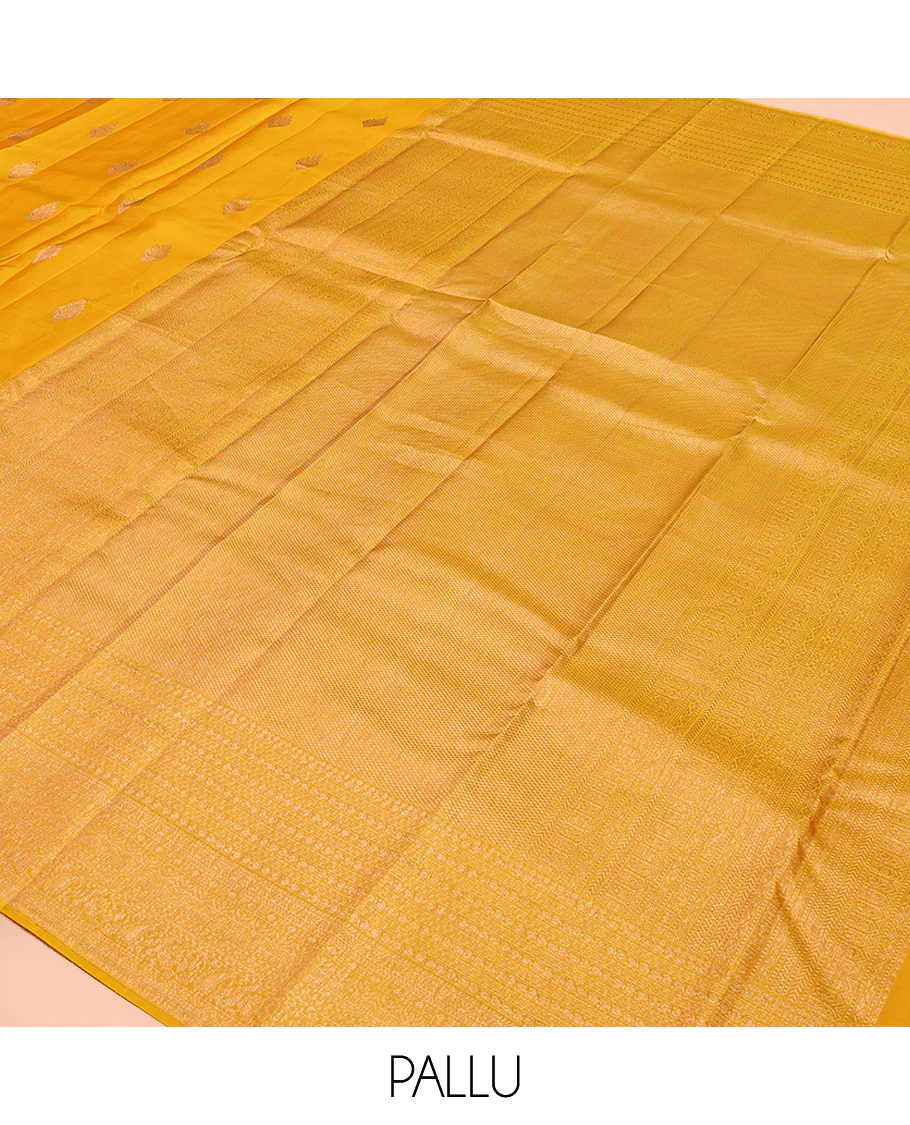 Yellow Kanchipuram Silk Saree, Subtly Sparkled with Zari Buttas All Over Its Body, Highlighted by a Zari Traditional Design Border, Grand Pallu, and Paired with a Matching Blouse - Image 5