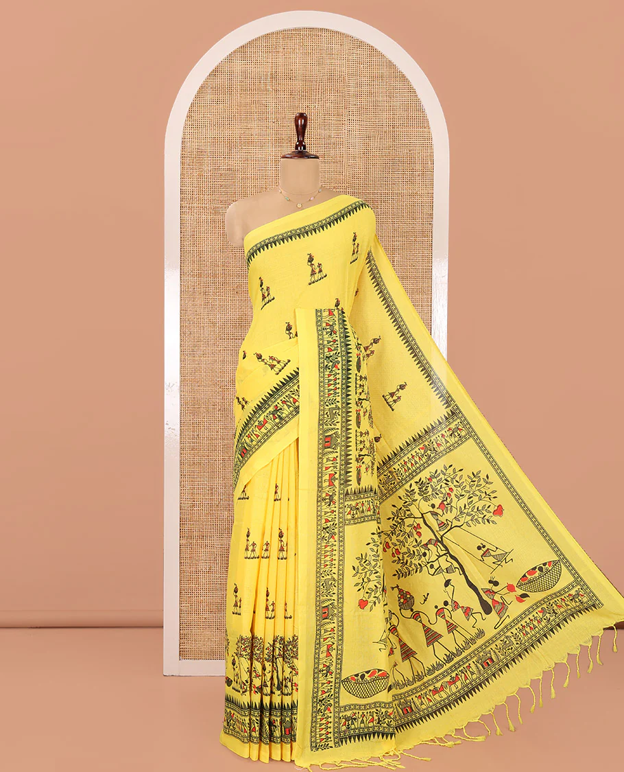 Yellow Khadi Mul Cotton Saree, Artfully Printed with Warli Motifs All Over Its Body, Highlighted by a Self-Border of Warli Print, Pallu of Warli Print, and Paired with a Matching Blouse