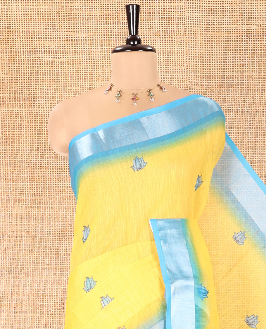 Yellow Linen Cotton Saree, Prettified with Floral Motifs Printed On Its Body, Complemented by Captivating Contrast Bavanji Border, Colorful Floral Vine Printed Pallu, and Paired with a Contrast Blouse - Image 2