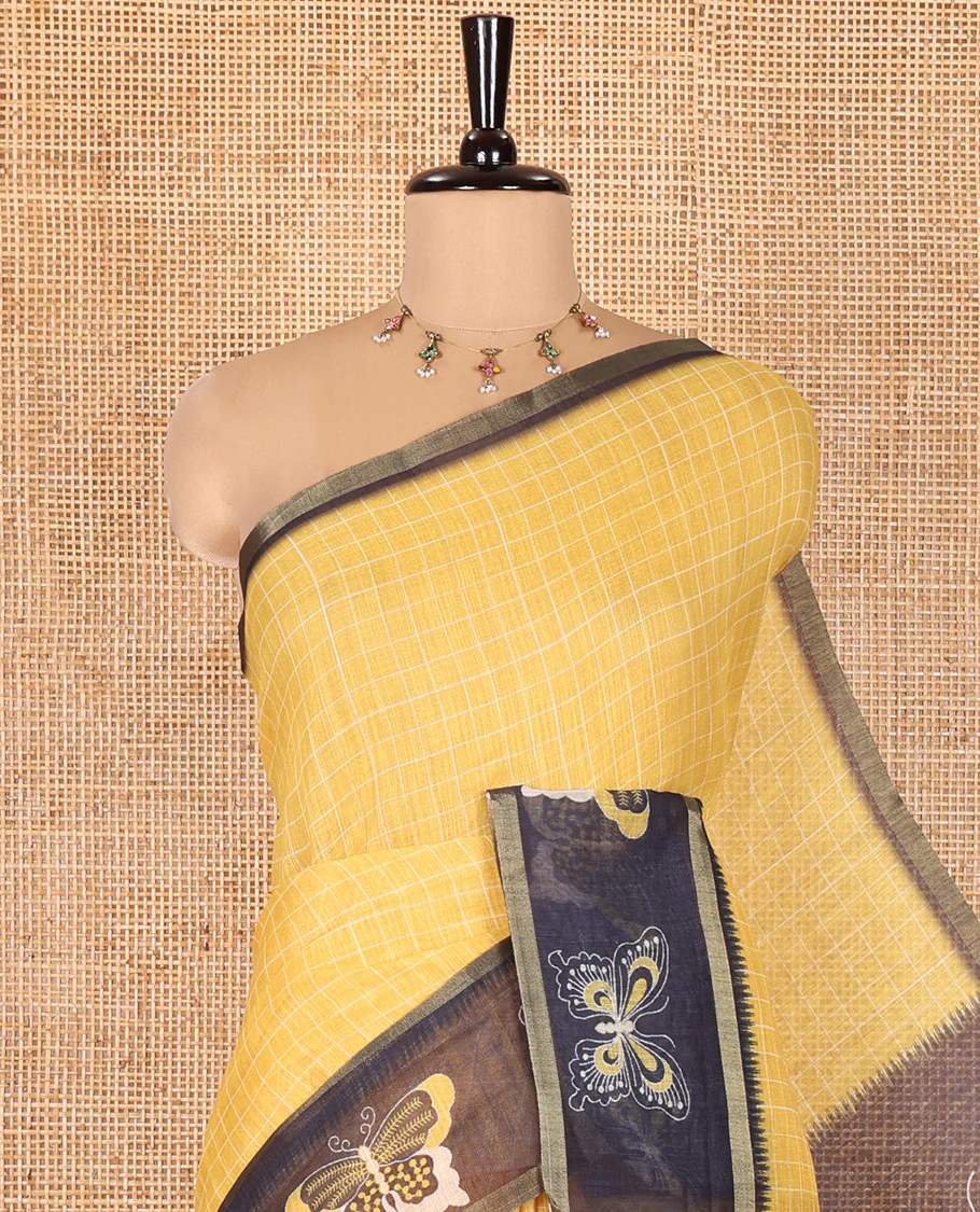 Yellow Linen Cotton Saree, Subtly Sparkled With Checked Design On Its Body, Complemented by Contrast Border Artfully Printed with Butterflies, Pallu Steeped with Butterflies, and Paired with a Contrast Blouse - Image 2