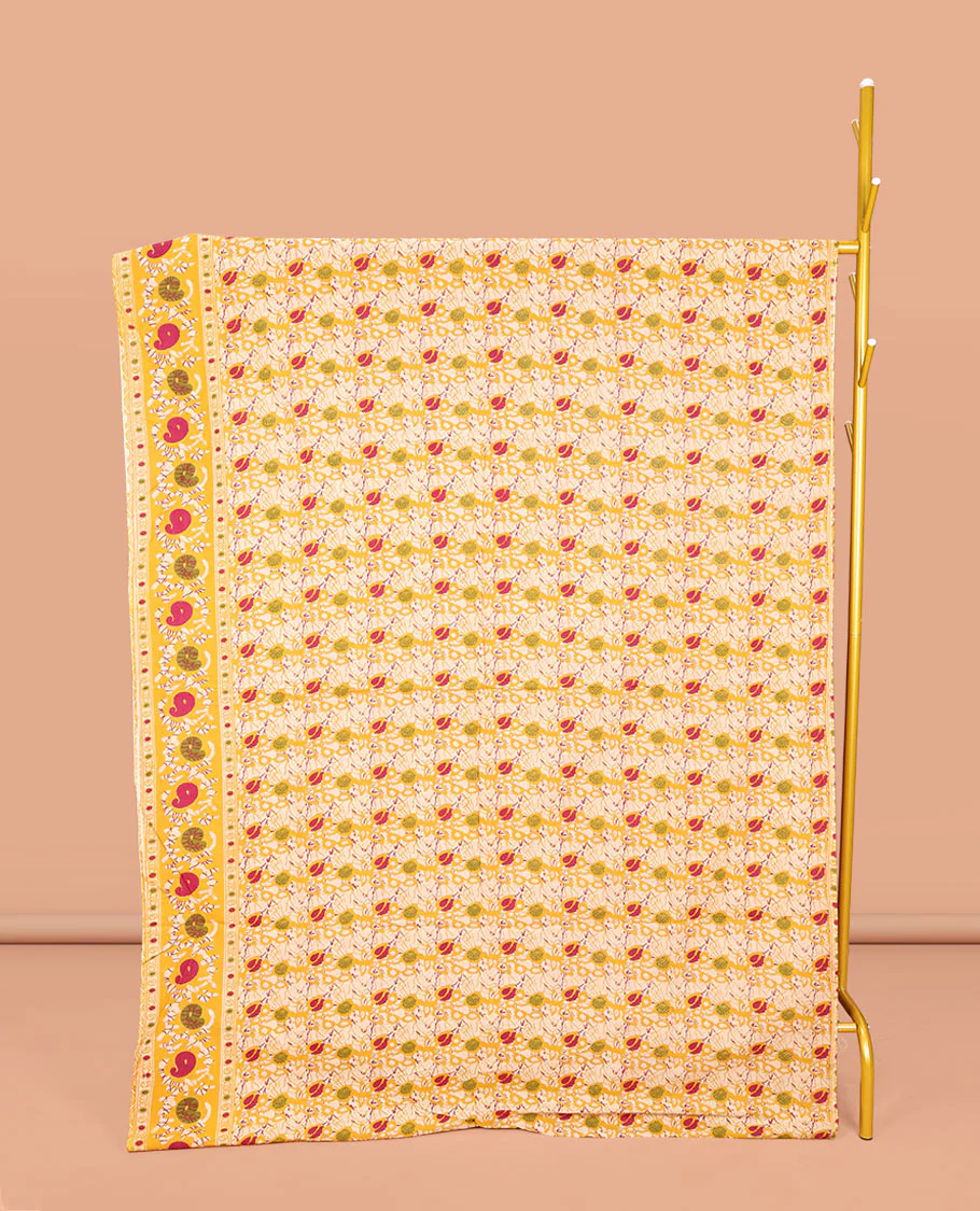 Yellow Machine-Printed Kalamkari Cotton Saree, Decked Up with Batik Vines on Its Body, Highlighted by a Self-Border of Batik Paisley Print, Pallu of Floral-Peacock Print, and Paired with a Printed Blouse