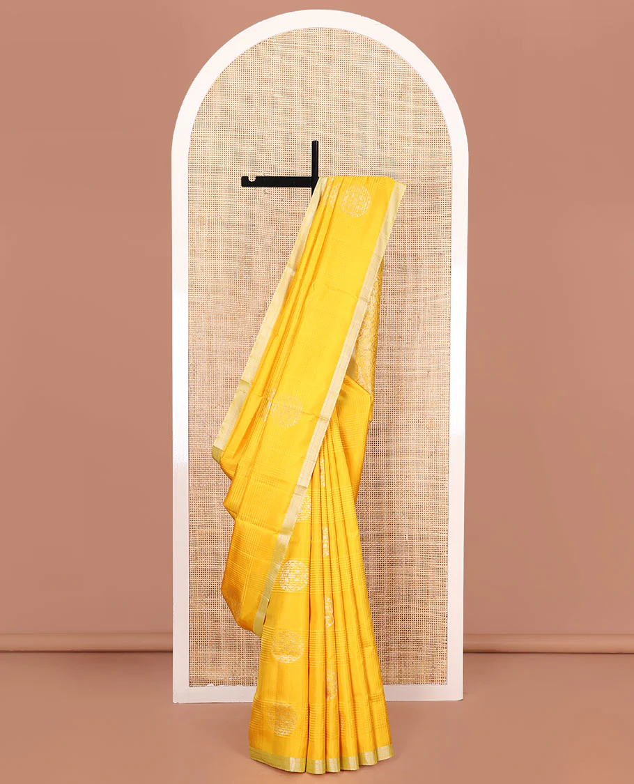 Yellow Mayuri Soft Silk Saree, Bedecked with Stripes and Buttas on Its Body, Subtle Zari Piping Border, Pallu Features Floral Jaal Designs, and Paired with a Matching Blouse