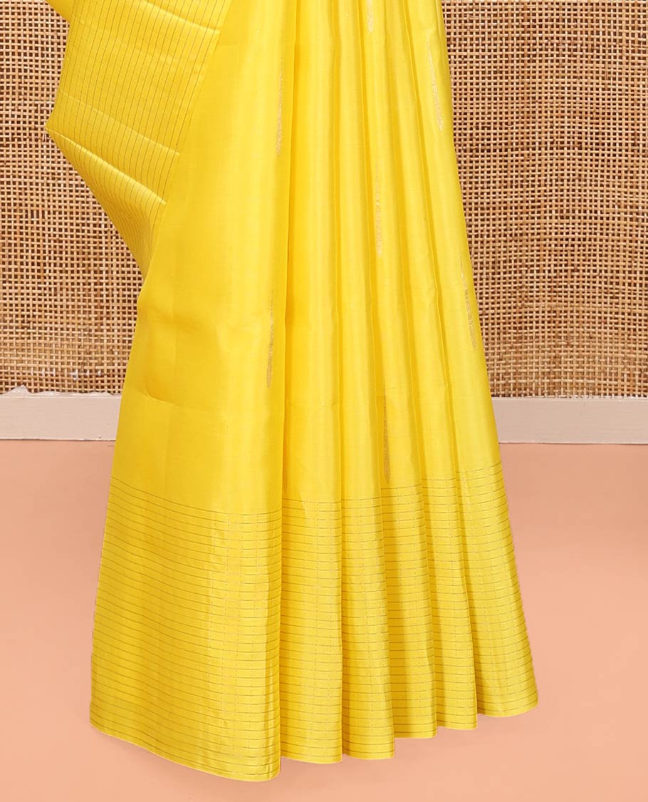 Yellow Mayuri Soft Silk Saree, Sparsely Sparkled with Malli Mokku Buttas All Over Its Body, Highlighted by Zari Striped Border, Pallu of Intricate Designs, and Paired with a Matching Blouse - Image 4