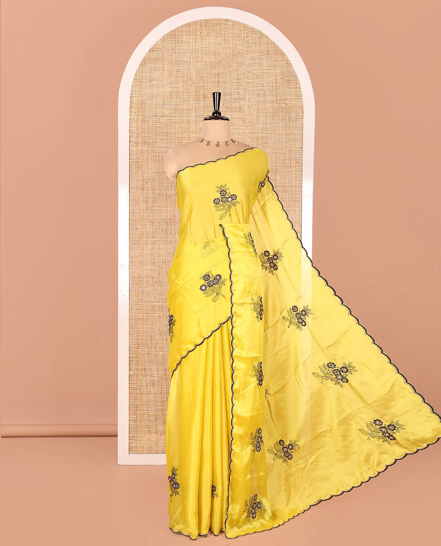 Yellow Rangoli Chiffon Saree, Beautified with Flower-Style Motifs Embroidered on Its Body, a Subtle Scallop Embroidered Border, a Self-Pallu, and Paired with a Contrast Embroidered Blouse