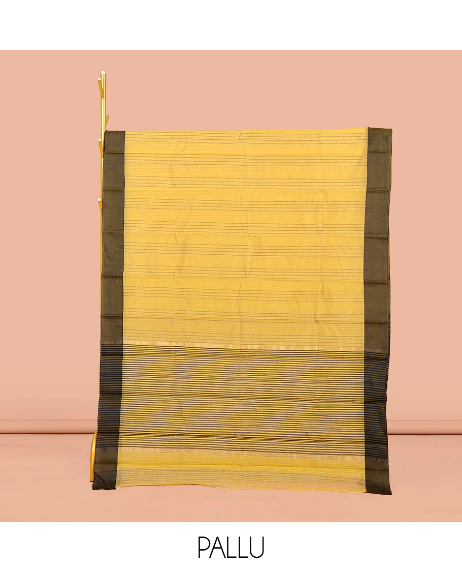 Yellow Semi-Silk Cotton Saree, Sparsely Sparkled with stripes All Over Its Body, complemented by a Contrast Border, Striped Pallu, and Paired with a Matching Blouse - Image 2