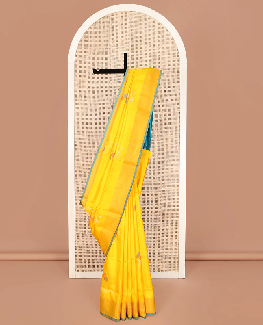Yellow Uppada Silk Saree, Prettified with Floral Meena Buttas All Over Its Body, Subtle Plain Border, Complemented by Contrast Pallu Steeped with Floral Meena Buttas, and Paired with a Contrast Blouse