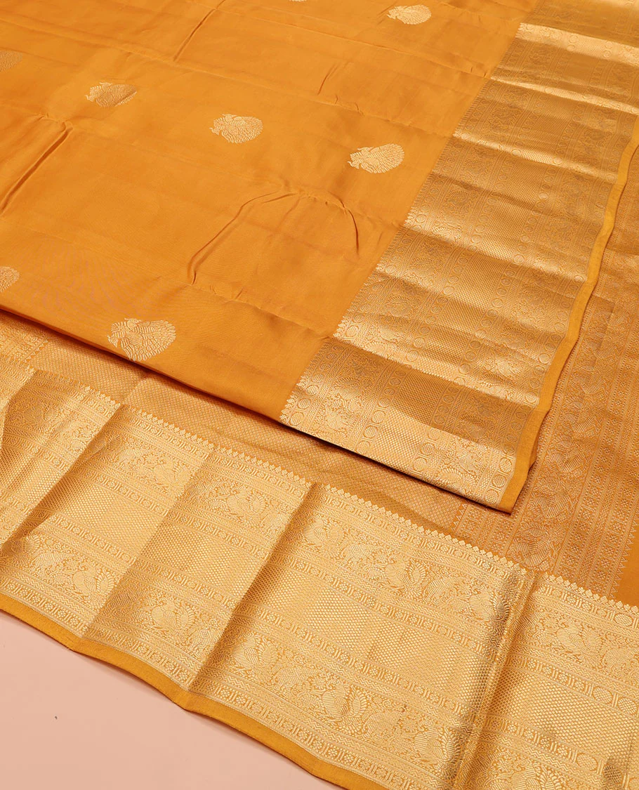 Yellow Vasundhara Lite Silk Mix Saree, Decorated with Zari Buttas, Highlighted by a Zari Border of Thilakam Mokku, Muthu, Kamalam, Mayil, Yaanai, Rettai Neli, and Mayil Kann Designs, Pallu of Mayil Kann Designs, and Paired with a Matching Blouse - Image 2
