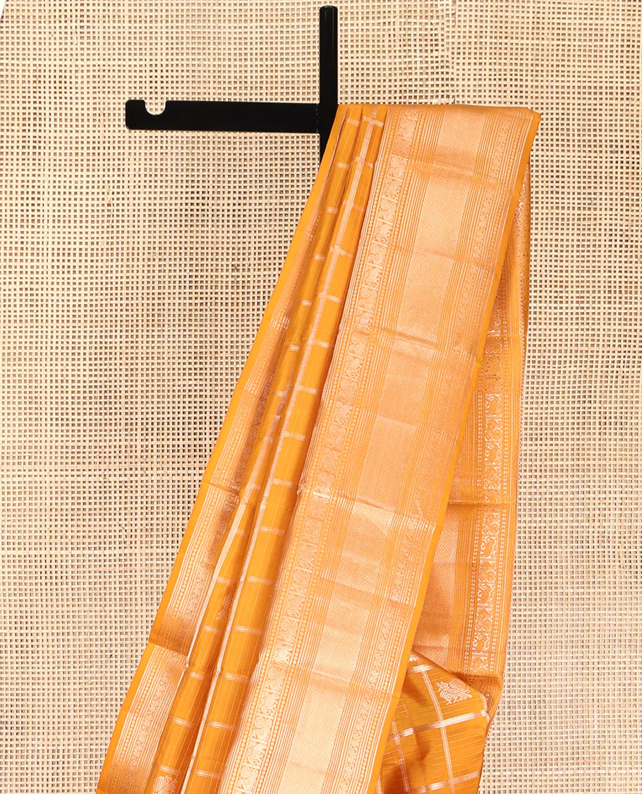 Yellow Vasundhara Silk Saree, Enriched with Zari Butta Enclosed Checked Design All Over Its Body, Highlighted by Zari Border of Thilakam Mokku, Muthu, Mayil, Yaanai, and Mayil Kann Designs, Grand Jaal Pallu, and Paired with a Matching Blouse - Image 3