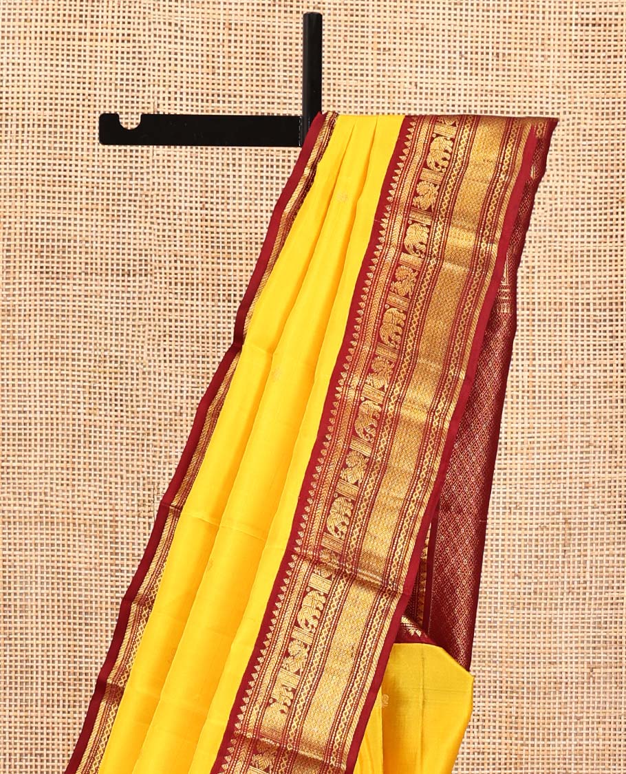 Yellow Vasundhara Silk Saree, Subtly Sparkled with Buttas All Over Its Body, Complemented by a Contrast Border of Thilakam, Neli, Kathir, Mayil, Yaanai, and Mayil Kann Designs, Grand Jaal Pallu, and Paired with a Contrast Blouse - Image 3